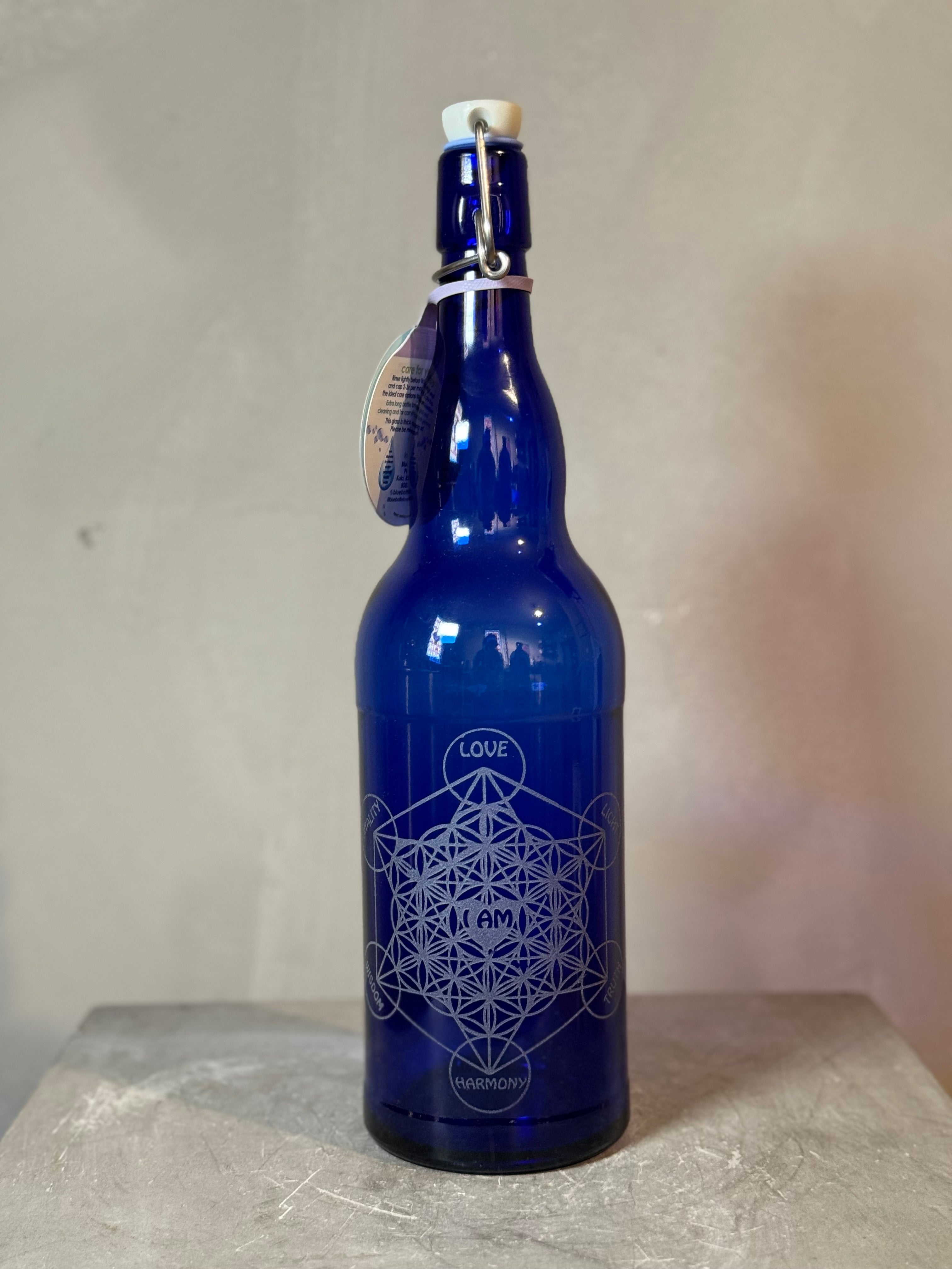 Blue glass bottles with sacred geometry - multiple designs - 2 sizes