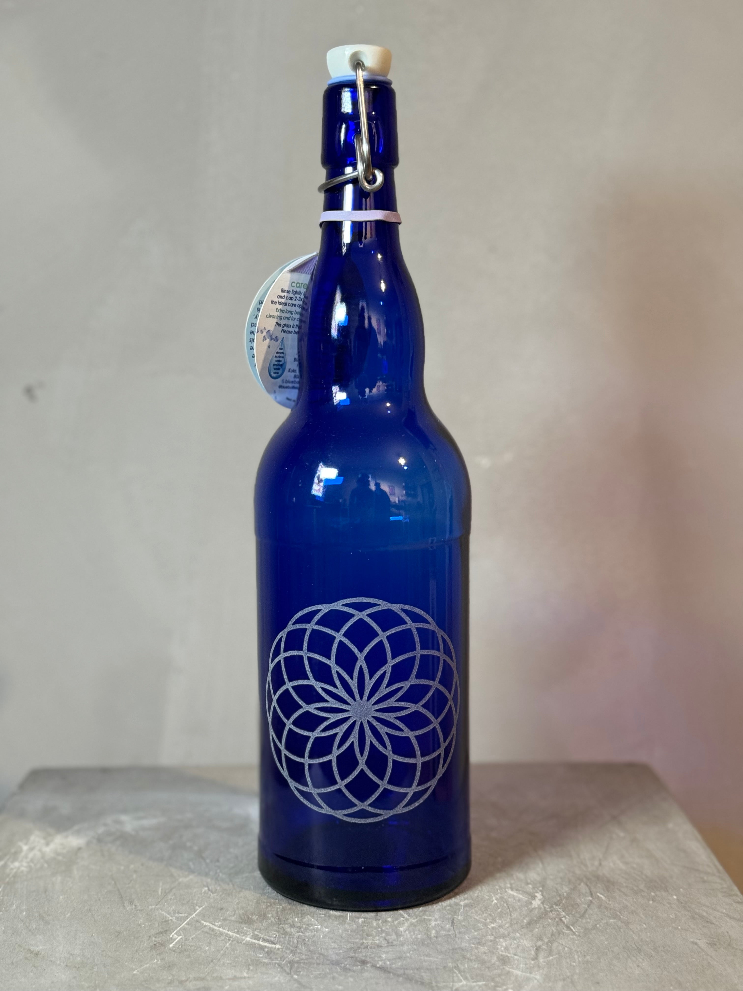Blue glass bottles with sacred geometry - multiple designs - 2 sizes