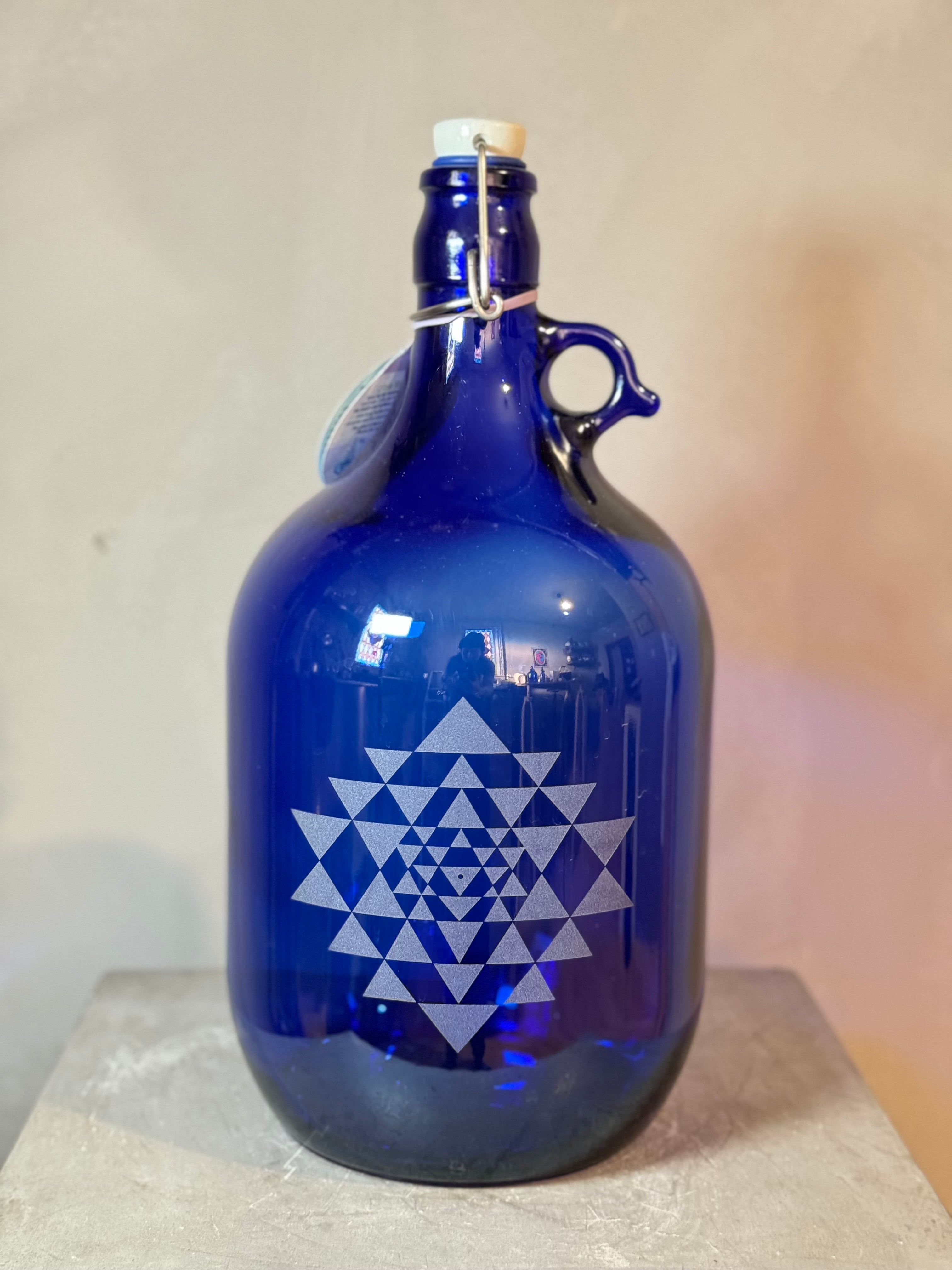 Blue glass bottles with sacred geometry - multiple designs - 2 sizes