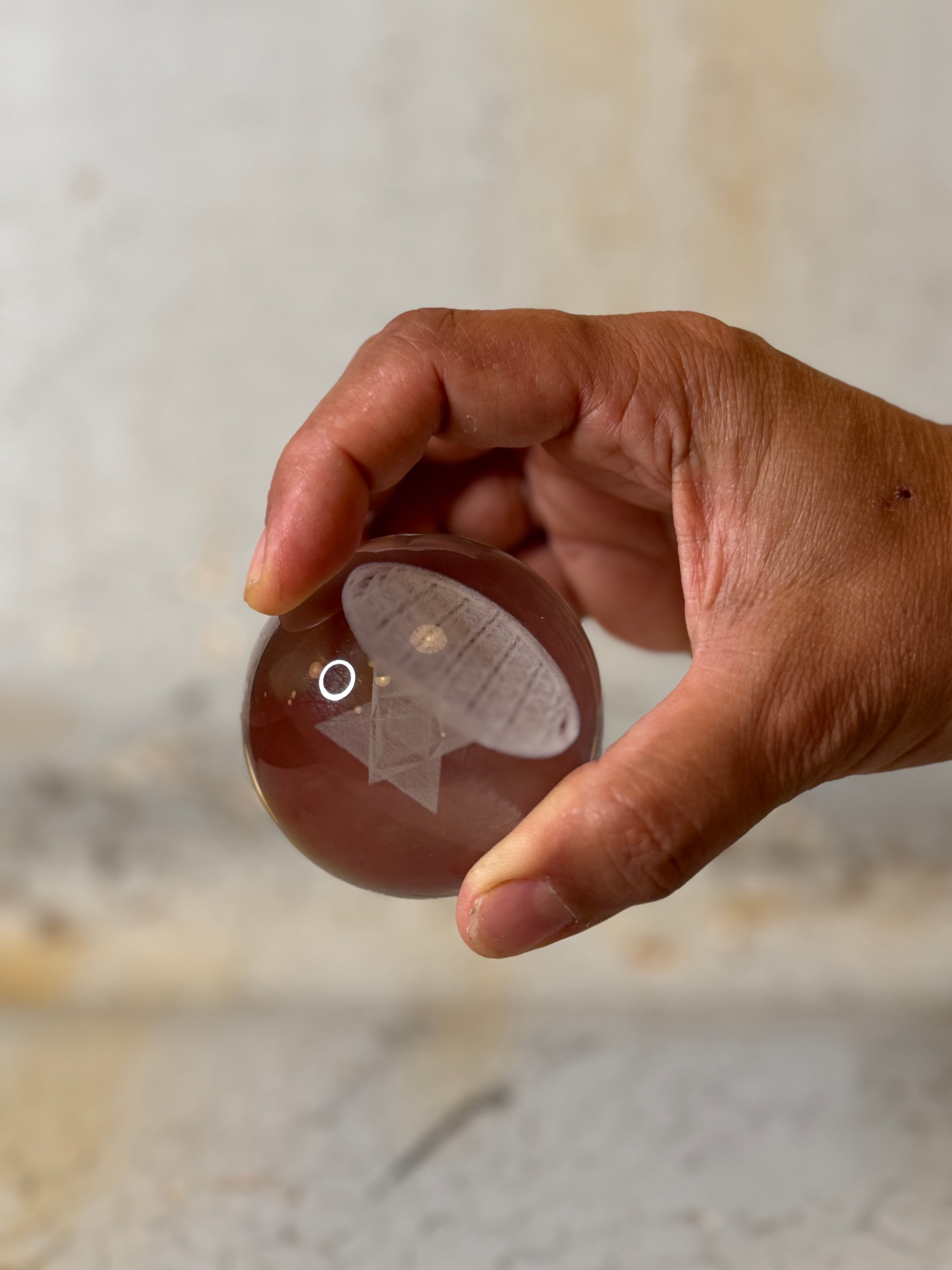 holographic glass sphere with merkaba and flower of life