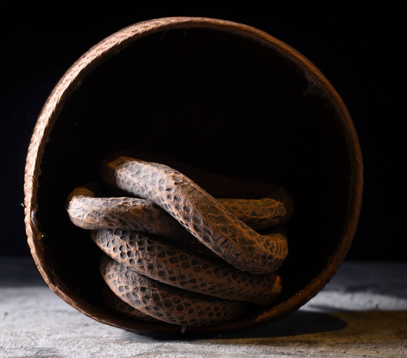 Coiled ceramic snake