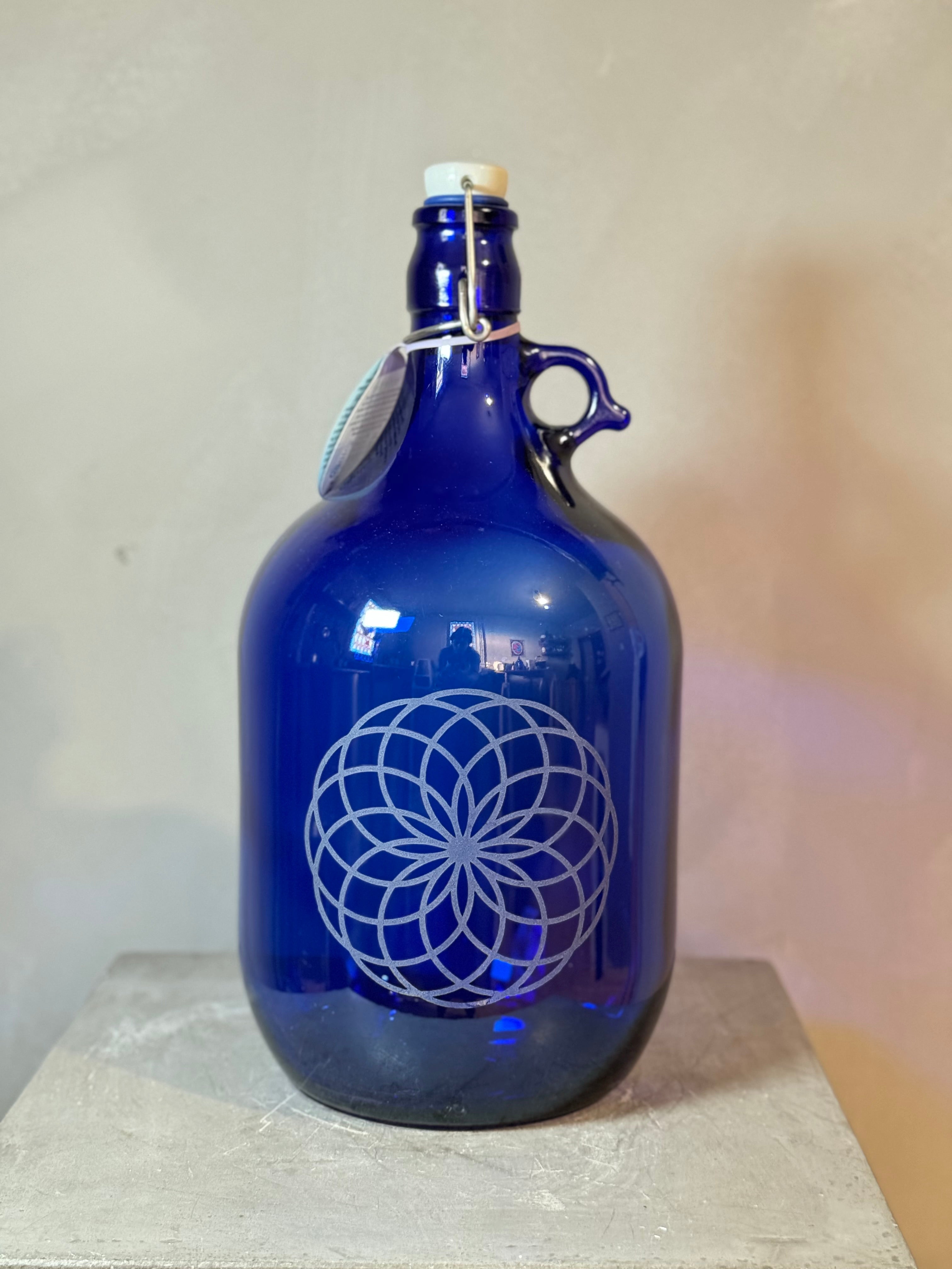 Blue glass bottles with sacred geometry - multiple designs - 2 sizes
