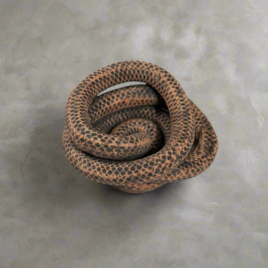 Coiled ceramic snake