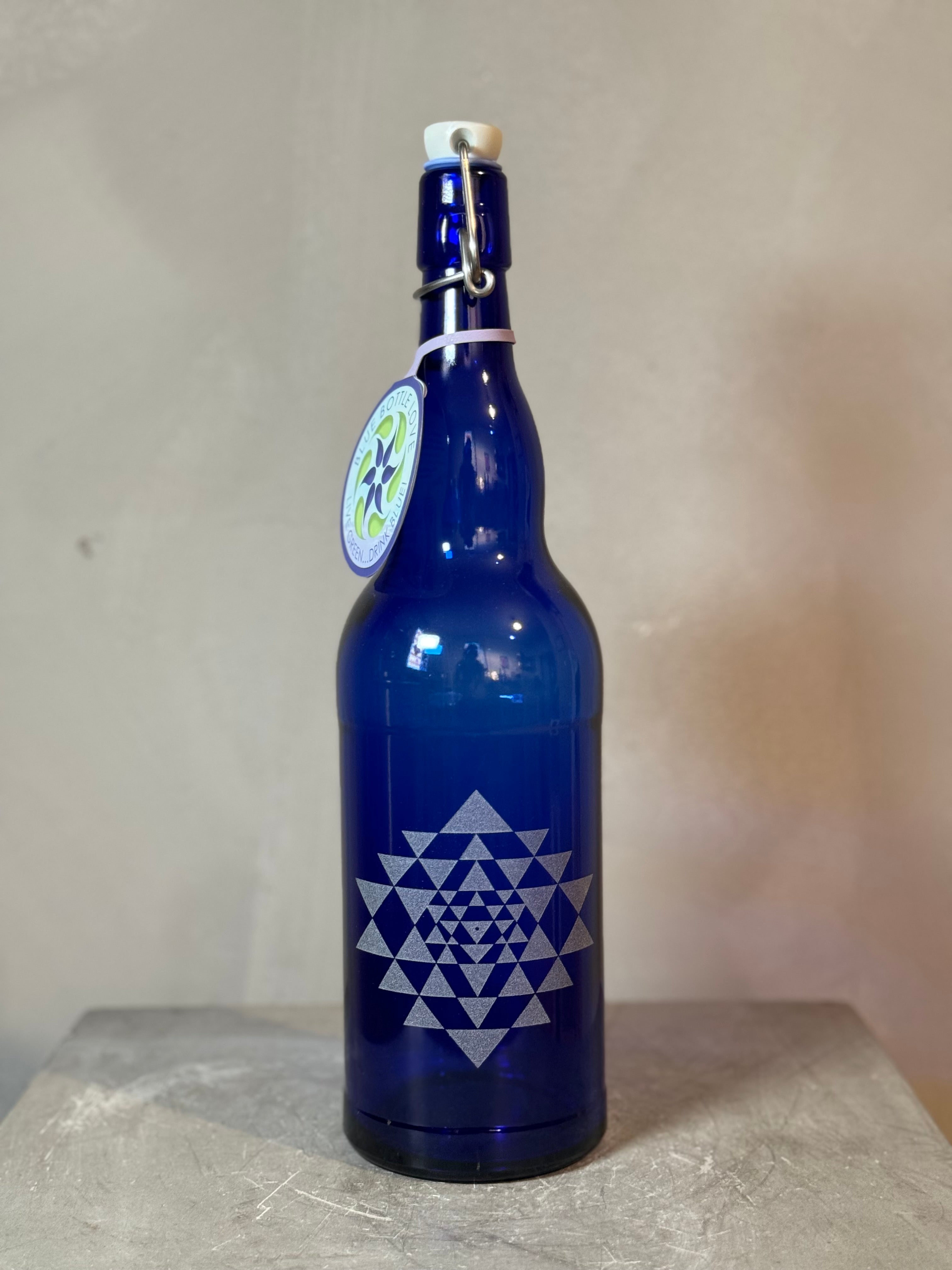 Blue glass bottles with sacred geometry - multiple designs - 2 sizes