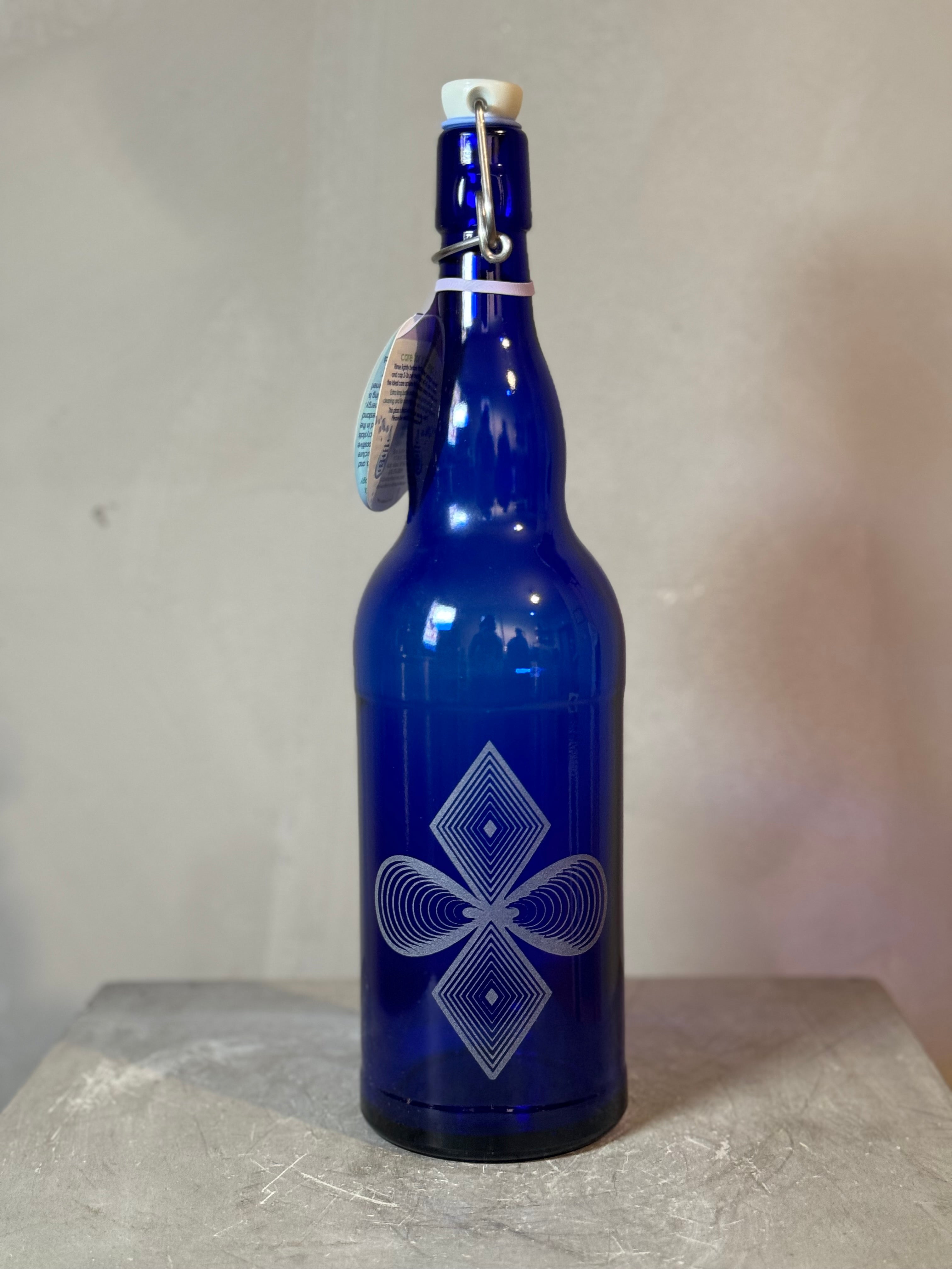 Blue glass bottles with sacred geometry - multiple designs - 2 sizes