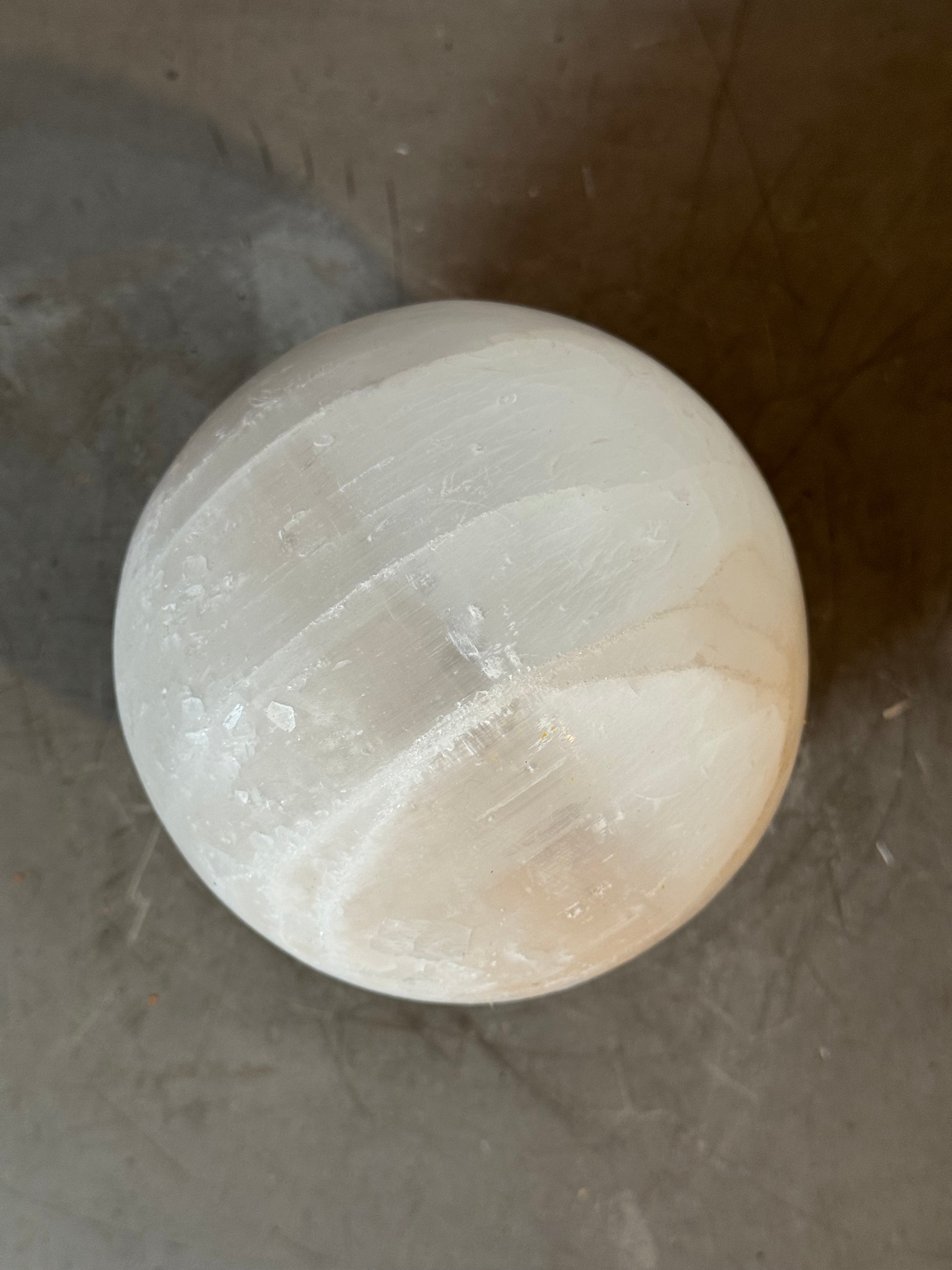 Selenite sphere with stand