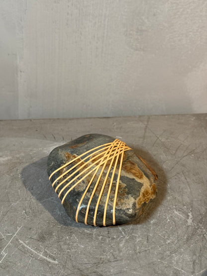 Shizu wrapped stone