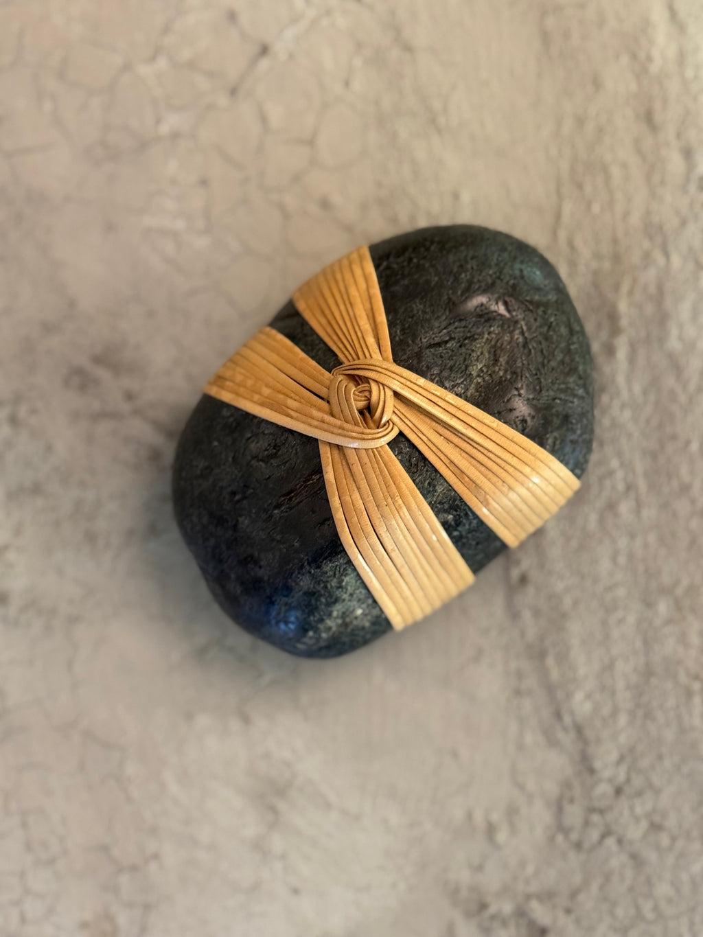 Shizu wrapped stone